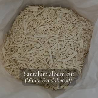 looking into a bag of lovely fragrant sandalwood chips, they are a greyish light colour
